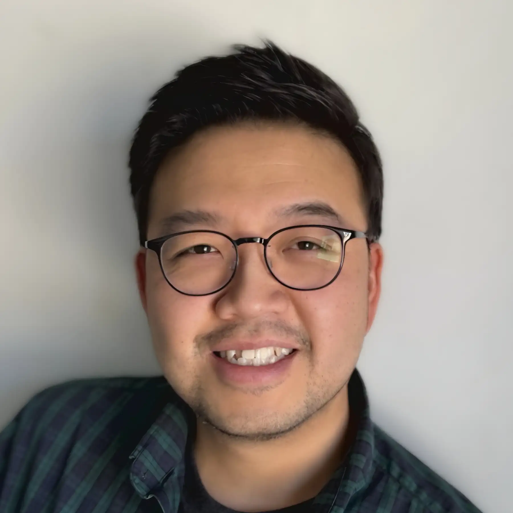 Headshot of Yunsik Kang.